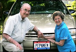 Bob and Alice LaFleche s license plate combines their nicknames,  Pep  and  Mem.