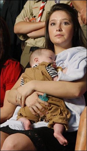 Bristol Palin holds her brother Trig during the rally where her mother was introduced as John McCain's running mate.