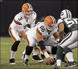 Browns quarterback Derek Anderson, left, takes a snap from Hank Fraley against the New York Giants. He suffered a concussion later and must pass a medical evaluation before the opener.