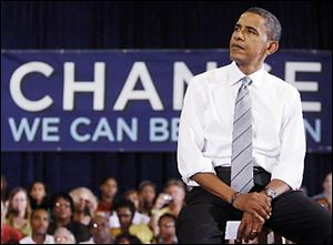Democratic presidential candidate Sen. Barack Obama, D-Ill., waits to speak during a town hall meeting at North Farmington High School in Farmington Hills, Mich., Monday, Sept. 8, 2008.