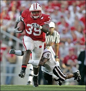 Wisconsin's P.J. Hill averages 23 carries - second most in the country - and 112 yards per game.