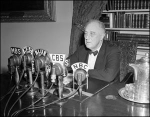 President Franklin D. Roosevelt broadcasts his annual message to Congress, Jan. 11, 1944, in Washington. The president topped a five-point victory program with a recommendation for national service legislation to make all able-bodied adults available for the war effort. (ASSOCIATED PRESS)
<br>
<img src=http://www.toledoblade.com/graphics/icons/video.gif> <b><font color=red>VIDEO</b></font color=red>: <a href=