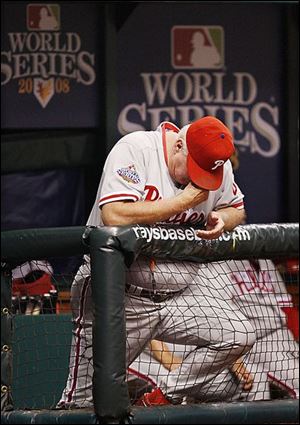 Phils' skipper Charlie Manuel, lowers his head during the 8th inning Thursday night as the Rays prevailed.