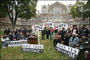 Toledo Public Schools Superintendent John Foley speaks at a rally to support renovations to Scott High School. Money from one of the TPS issues on Tuesday s ballot would aid in renovating the Old West End school as well as several other buildings,  including Waite High in East Toledo.