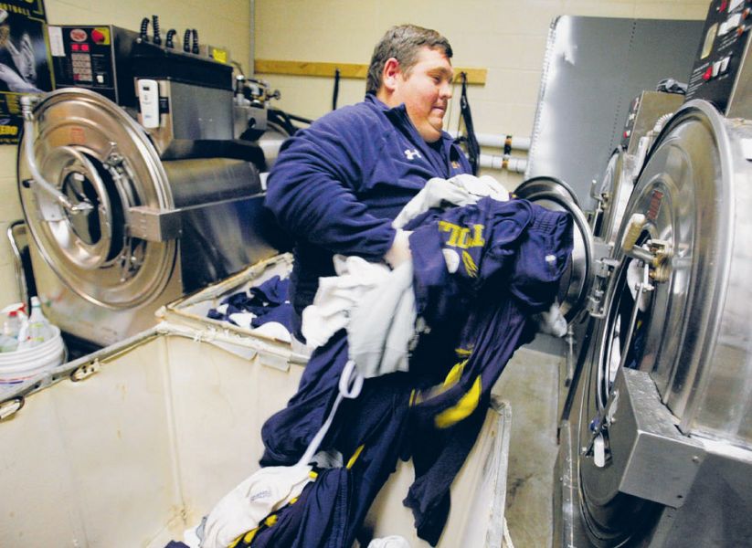 UT s equipment manager and staff keep the football team looking good