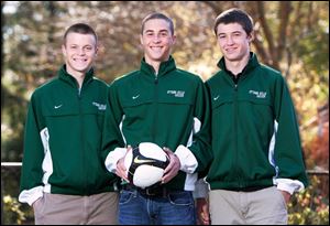 Tri-captains, from left to right, Ben Bryant, Sam Kuehnle and Jack Jamieson have led Ottawa Hills to its first state title game.