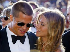 Brad Pitt and Jennifer Aniston in happier days before their marriage broke up in 2005.