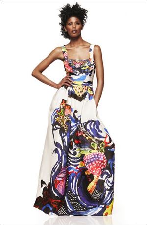 Wearable art is exemplified by French designer Christian Lacroixs wrap waist silk organza gown brush-stroked with a color-rich abstract print. Fashions like these will be featured at the Ebony Fashion Fair Sunday at the SeaGate Convention Centre.