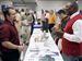 Owens-job-fair-puts-focus-on-veterans.jpg Cameron Volkman, left, of Delta discusses job opportunities with Bobby Green of Western & Southern Financial Group.