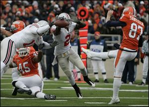 The Buckeyes  Malcolm Jenkins breaks through to knock away the punt by Anthony Santella. The play resulted in a safety.