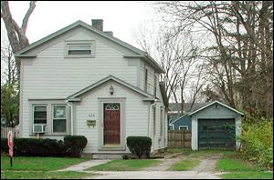 The historic house at 408 West Front St. as it appeared before its renovation.
