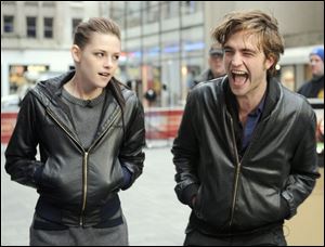 Kristen Stewart, left, and Robert Pattinson, of the new movie <a href=