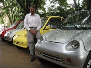 Chetan Maini is the brains behind the REVA, a two-door hatchback selling for $8,000 to $10,000 with a top speed of 50 mph. He believes his company can sell 50,000 per year in five years.