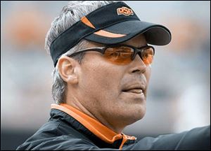 Oklahoma State defensive coordinator Tim Beckman graduated from the University of Findlay.