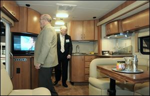 A bar sink is part of the luxury appointments in a buslike motor home at the annual show in Louisville.