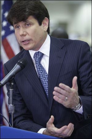 In this Monday, Aug. 25, 2008 file photo, Illinois Gov. Rod Blagojevich discusses an executive order he signed in Chicago that extends the language of an ethics bill passed by the House and the Senate earlier this year to include campaign contributions from large state contractors to officeholders. 