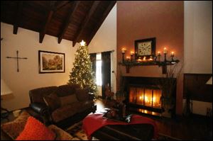 A fireplace is aglow in the home of  Dave and Diana Dittman.