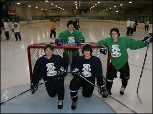 St. John s has plenty of experience back, led by, from left, Eric Brown, Ray Morris, Luke Stansfield and George Wilkinson. The Titans finished 26-10-1 last season, but in third place in the NHC Red Division.