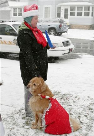 nbrn dogs11p  The Blade/Luke Black 12/06/2008  Betsy Noe member of Project Second Chance with Buffett at the Holiday Hounds on Parade is among the events at this weekend's Christmas in Ida Festival.  It begins at 2:15 p.m.  Starts Ida East Road at the Methodist church, walks south on Lewis Avenue, and disband at Ida Street.