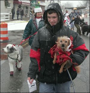 nbrn dogs11p  The Blade/Luke Black 12/06/2008   Jacob Werden with his dog Arfer at the Holiday Hounds on Parade is among the events at this weekend's  Christmas in Ida Festival.  It begins at 2:15 p.m.  Starts Ida East Road at the Methodist church, walks south on Lewis Avenue, and disband at Ida Street.