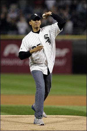 Barack Obama throws out the first pitch before the second game of the American League championship series.