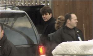 Gov. Rod Blagojevich leaves his home to go to work in his office in Chicago, a day after his arrest on federal corruption charges. 