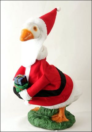 <b>9. Concrete goose and Santa outfit</b>