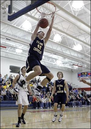 Toledo Christian's Ethan Michael takes flight during Friday night's action in the Knight Christmas Classic.