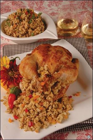 Easy yet elegant recipes, like this stuffed chicken with rice side dish, are sure to impress your holiday guests.