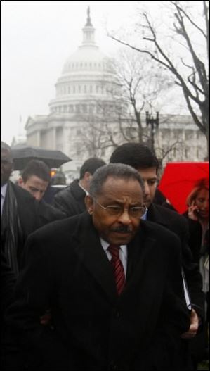 Illinois U.S. Senate appointee Roland Burris leaves the U.S. Capitol in Washington on Tuesday morning after he was turned away when he appeared to take his seat.
