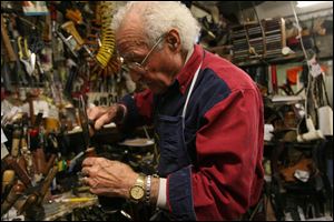 Pasquale DiTerlizzi, who has been in the shoe-repair business 62 years, said his shop has become busier than ever, with customers bringing in handbags, suitcases, backpacks, and gloves as well as shoes. 