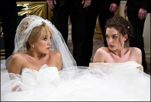 Kate Hudson, left, and Anne Hathaway in 'Bride Wars.'