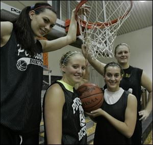 Pettisville seniors, from left, Haley Nofziger, Alexa Short, Katie Weber and Brittany Weber have helped their team build a 7-0 record.