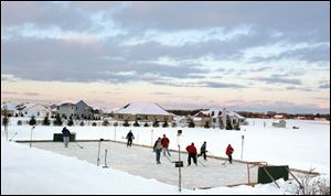 On any given cold winter day, the backyard rink at the Mauder household in Lake Township is dotted with hockey players.