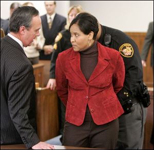 Karyn McConnell Hancock was convicted of stealing more than $624,000 from 22 clients.
