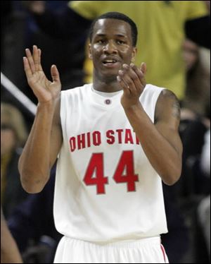 Ohio State guard William Buford celebrates after a play Saturday night against Michigan. Ohio State defeated No. 25 Michigan 65-58.