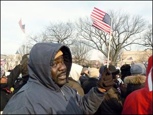 Mike 'Huggy Bear' Huggins shows his support for President Obama on the National Mall.