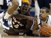 Comfortable-Rockets-top-Chips-at-home-2.jpg Toledo's Jonathan Amos looks for help as Central Michigan's Jacolby Hardiman reaches to try to take the ball away.