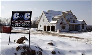 The construction site in Dellville, Pa., is quiet and likely to remain so. Yesterday's reports showed the sales of new homes like this one posted the weakest annual result since 1982.