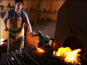 Hans Ruebel, from the Toledo Museum of Art, demonstrates blacksmithing techniques.He will be continuing his demonstrations and classes each Wednesday in February from 3 to 7 p.m at the Sylvania Historical Village, 5717 North Main St., in Sylvania. 