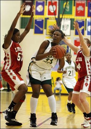 Central's Brianna Jones (50) tries to defend against Yolanda Richardson, who led Start with 23 points and 11 rebounds.