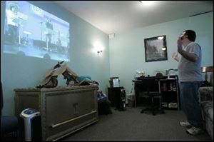 A worshipper at Adat Adonai Messianic Jewish Synagogue keeps the prayer chain going.
