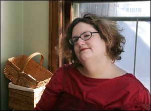 The 5-foot, 7-inch Rebecca Golden has lost about 300 pounds since having surgery in December, 2005.
