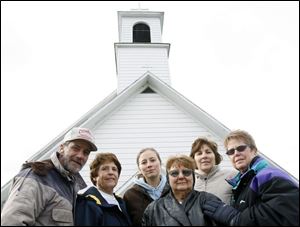 Former parishioners of the closed St. James Catholic Church in Kansas, Ohio, are taking their fight to the Ohio Supreme Court. From left are Ed Row, Virginia Hull, Sarah Kleinfelter, Helen Durst, Margie Steinmetz, and Sue Schwab, shown in 2007.
