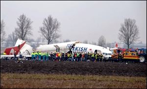 A Turkish Airlines plane with 134 aboard slammed into a field while attempting to land at Amsterdam's Schiphol Airport on Wednesday and broke into three pieces.
<br>
<img src=http://www.toledoblade.com/graphics/icons/video.gif><b><font color=red> VIDEO</b></font color=red>: <a href=