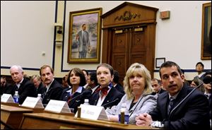 From left, Capt. Chesley Sullenberger III, 1st Officer Jeffrey Skiles, flight attendants Sheila Dail, Donna Dent, and Doreen Welsh, and air traffic controller Patrick Harten testify before the subcommittee of the House Transportation and Infrastructure Committee. They spoke on the safe landing the US Airways Flight 1549.