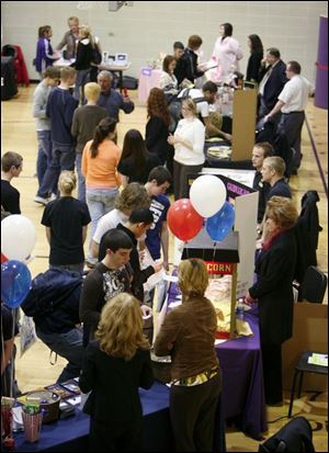 Maumee H.S. students attend the business fair.
