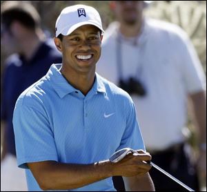 After rehabbing a knee injury, Tiger Woods was happy to be back on the course at the Accenture Match Play Championship. 