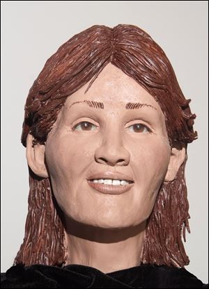 Autopsy photos aided in sculpting a re-creation of the victim.