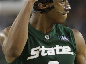 UConn knew who this masked man was, but the Huskies couldn't stop MSU's Raymar Morgan.
<br>
<img src=http://www.toledoblade.com/assets/gif/TO1599743.GIF> <b><font color=red>MULTIMEDIA:</b></font color=red> <a href="/assets/pdf/TO6590446.PDF" target="_blank "><b>NCAA men's basketball bracket</b></a>  Michigan State vs. North Carolina
<br>
<img src=http://www.toledoblade.com/graphics/icons/video.gif><b><font color=red> VIDEO</b></font color=red>: <a href="http://video.ap.org/?t=By%20Section/U.S.&g=0406s_NCAA_Preview&f=OHTOL" target="_blank "><b> Spartans, Tar Heels ready for NCAA title game</b></a>